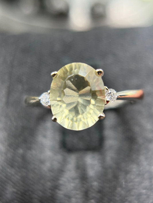Libyan Desert Glass Ring | 8x10mm Oval Faceted Tektite | Silver‑Tone Prong Setting with Side Stones | Gift Box Included