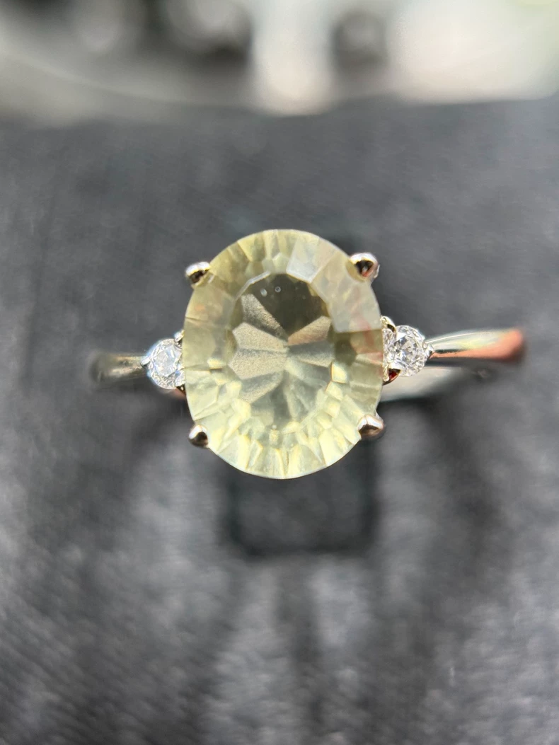 Libyan Desert Glass Ring | 8x10mm Oval Faceted Tektite | Silver‑Tone Prong Setting with Side Stones | Gift Box Included